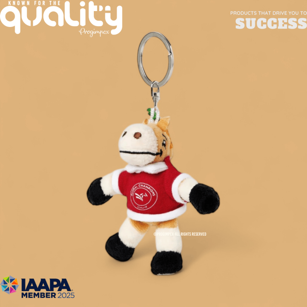 Progimpex is an expert in creating mini plushies and keychains. Red Mini Horse Keychain Plush Toy with red shirt.